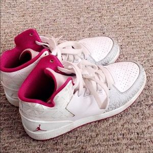 White and pink Jordan’s